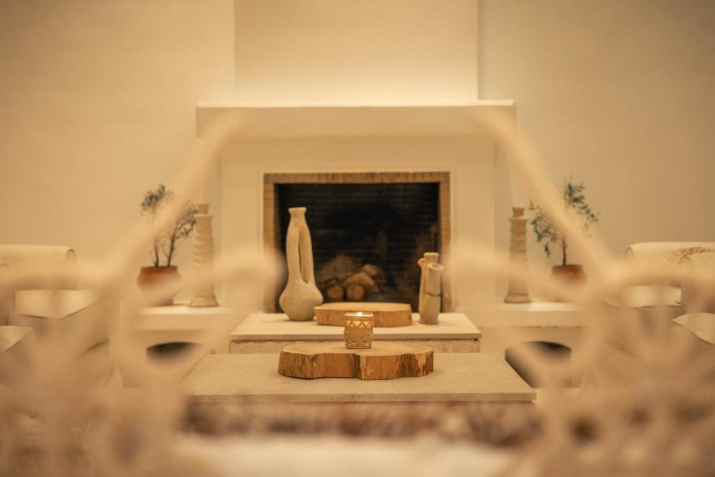 Posezení v ubytování Les Palmiers Boutique Hôtel & Spa