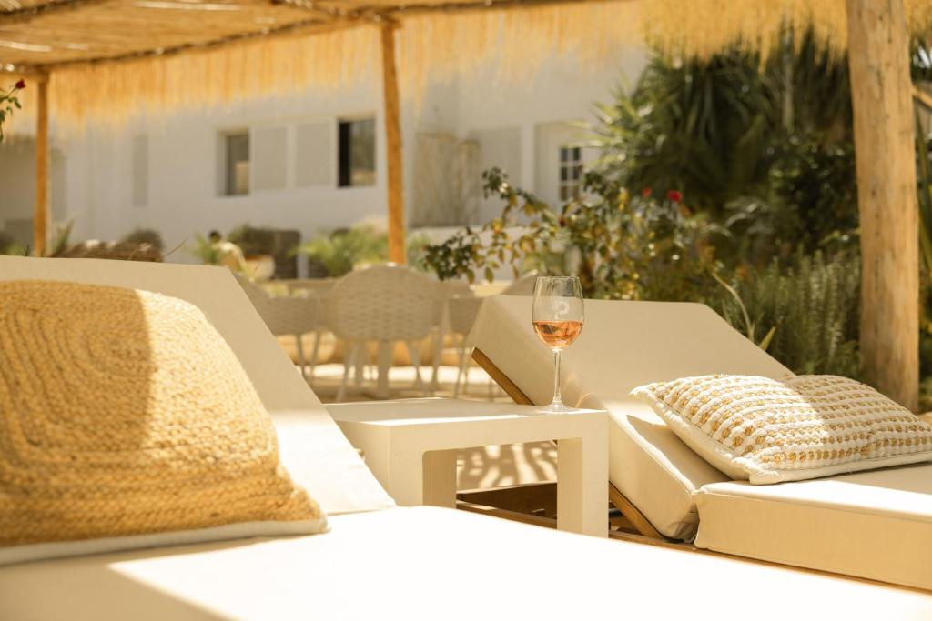 Posezení v ubytování Les Palmiers Boutique Hôtel & Spa