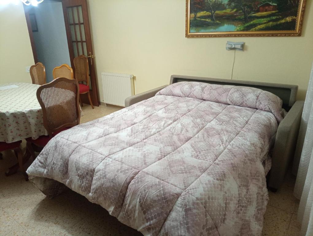 Posteľ alebo postele v izbe v ubytovaní Ca la Cris