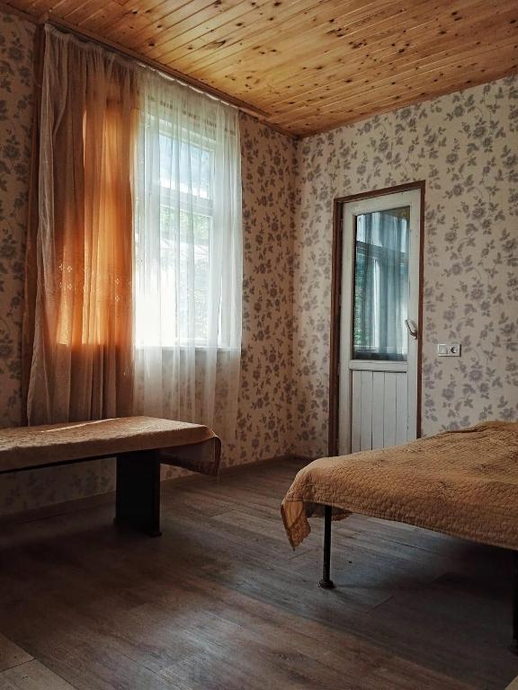 Postel nebo postele na pokoji v ubytování Kari