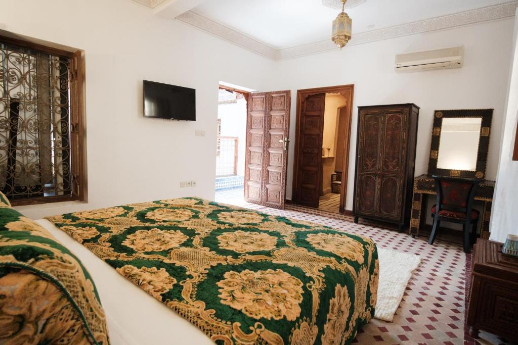 Postelja oz. postelje v sobi nastanitve Riad Dar Laura