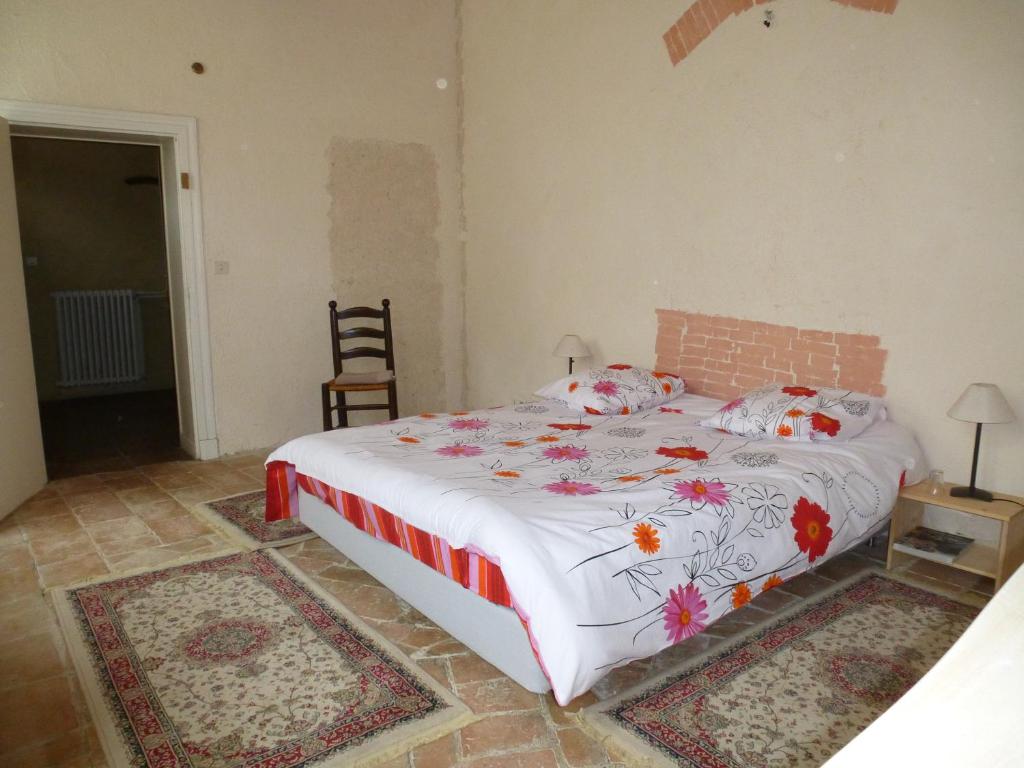 Postel nebo postele na pokoji v ubytování Un Coin de Paradis
