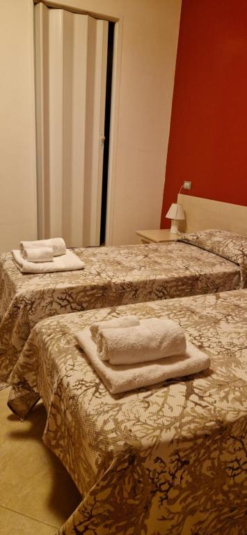 Postel nebo postele na pokoji v ubytování B&B Casa Mia