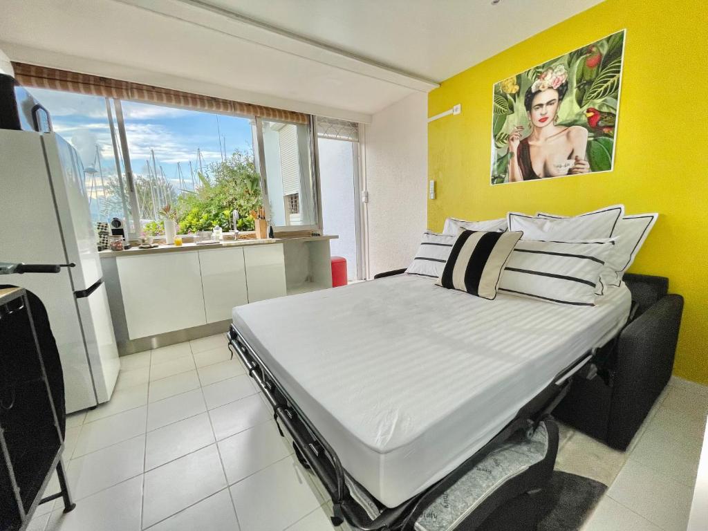 Postel nebo postele na pokoji v ubytování Appartement Frida de la Marina