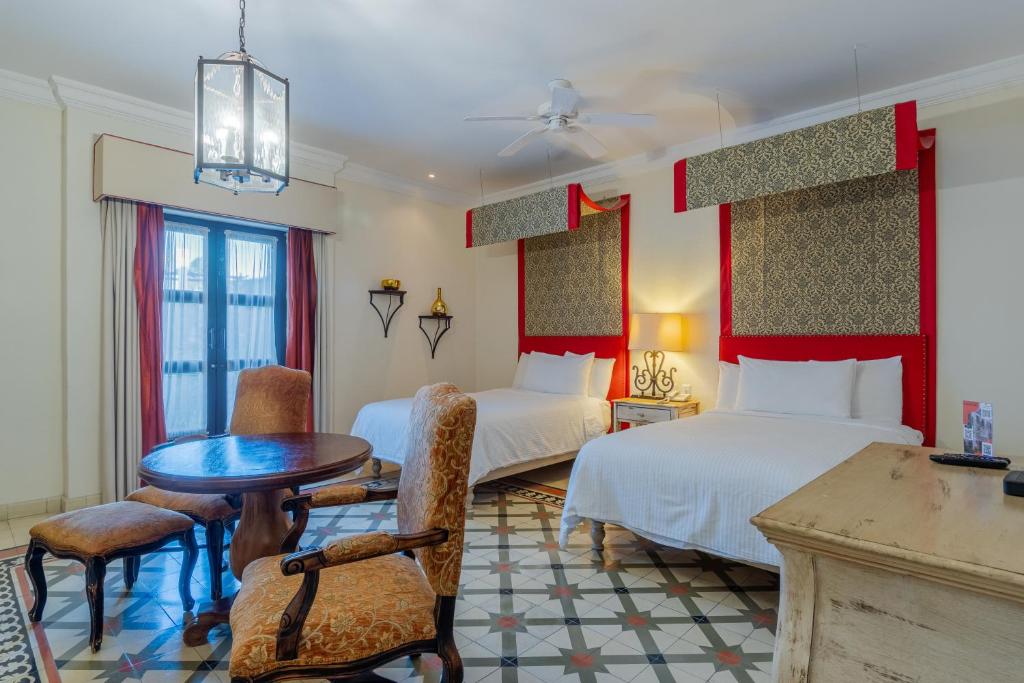 Postel nebo postele na pokoji v ubytování Hotel Casa Primavera Boutique & Spa