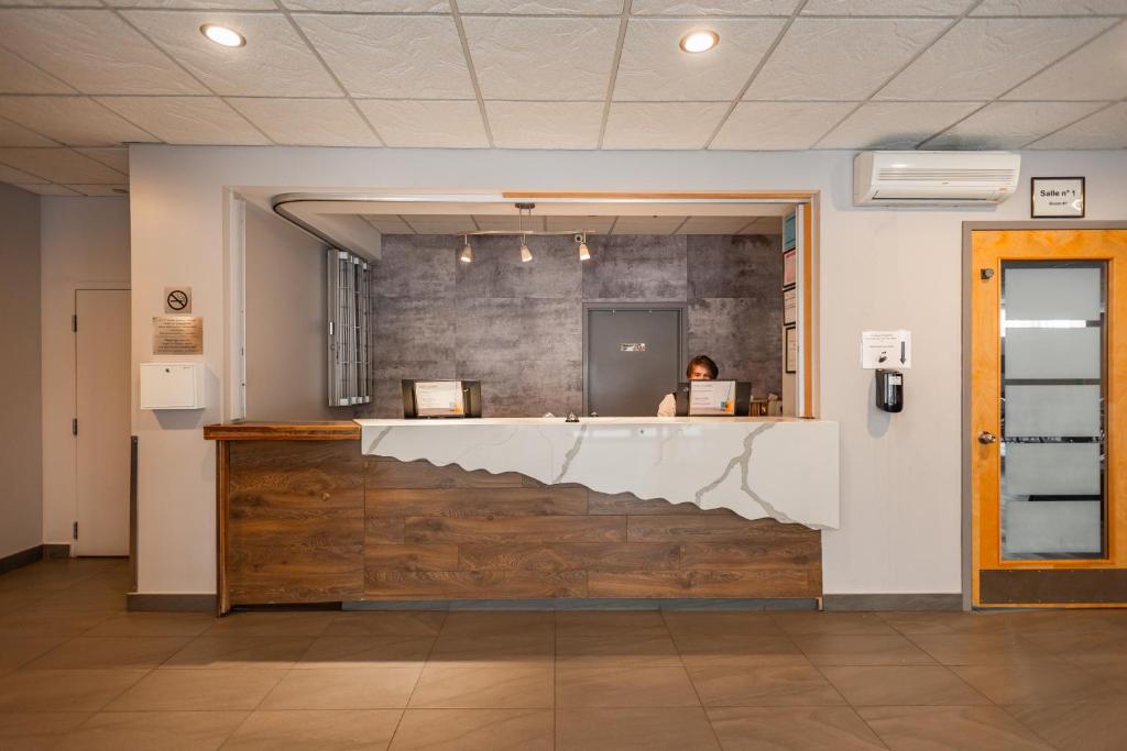 Vstupní hala nebo recepce v ubytování Hotel les Suites Labelle