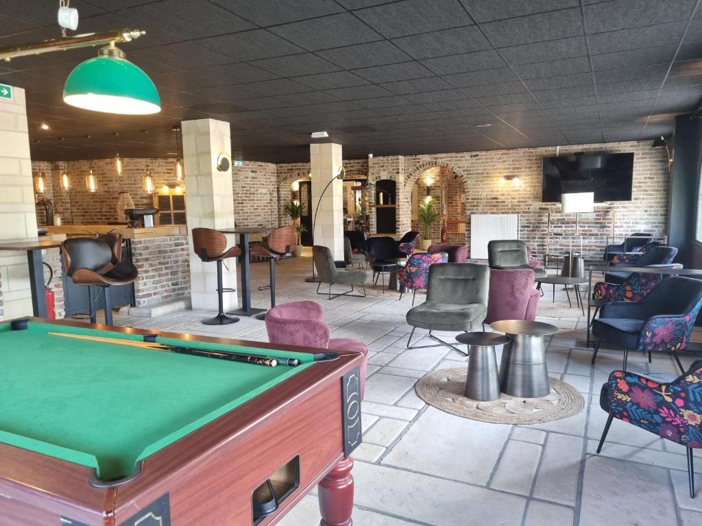 Posezení v ubytování Hôtel Le Prieuré
