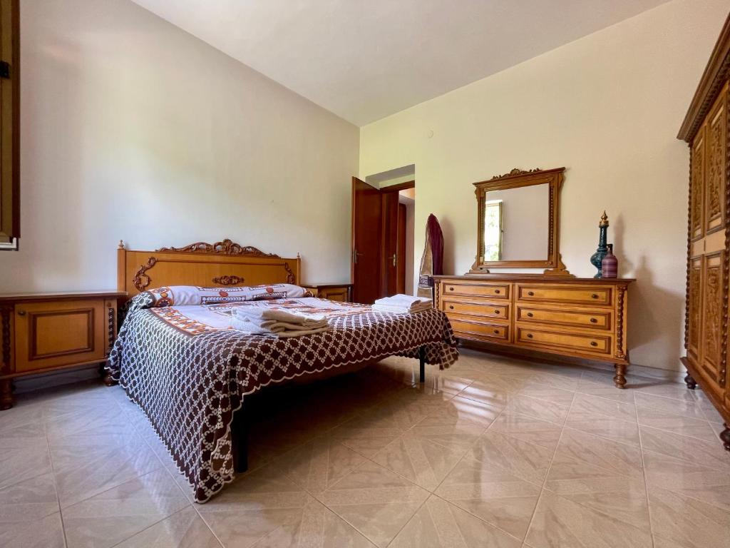 Krevet ili kreveti u jedinici u objektu Villa con Piscina Donna Romina