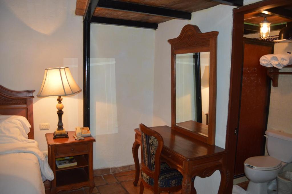 Postel nebo postele na pokoji v ubytování Hotel Meson del Mar