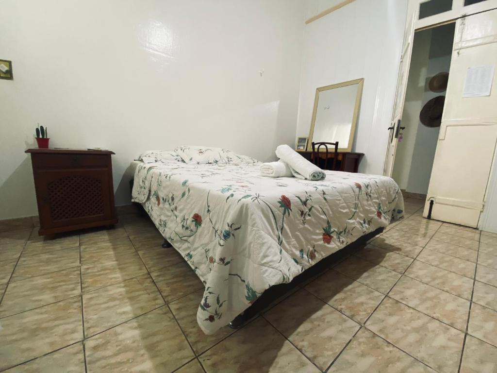Postel nebo postele na pokoji v ubytování Aldeia Hostel