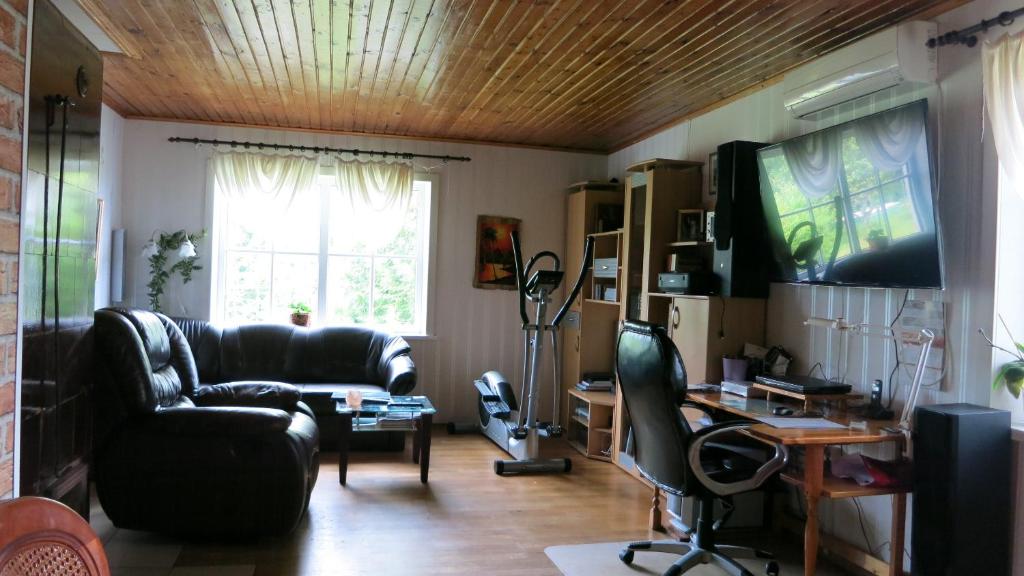 TV a/nebo společenská místnost v ubytování Mäe Farm