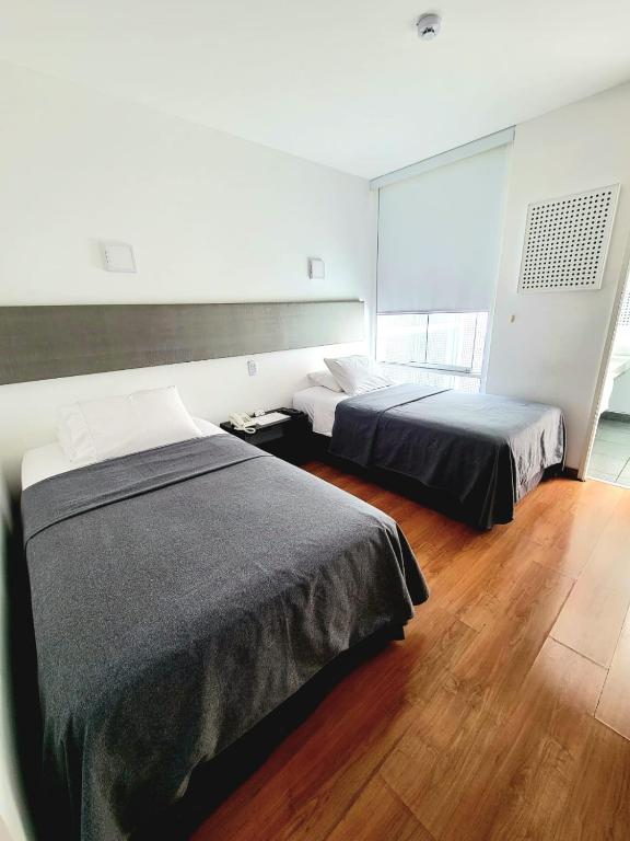 Postel nebo postele na pokoji v ubytování 3B Barranco by Katari Hoteles