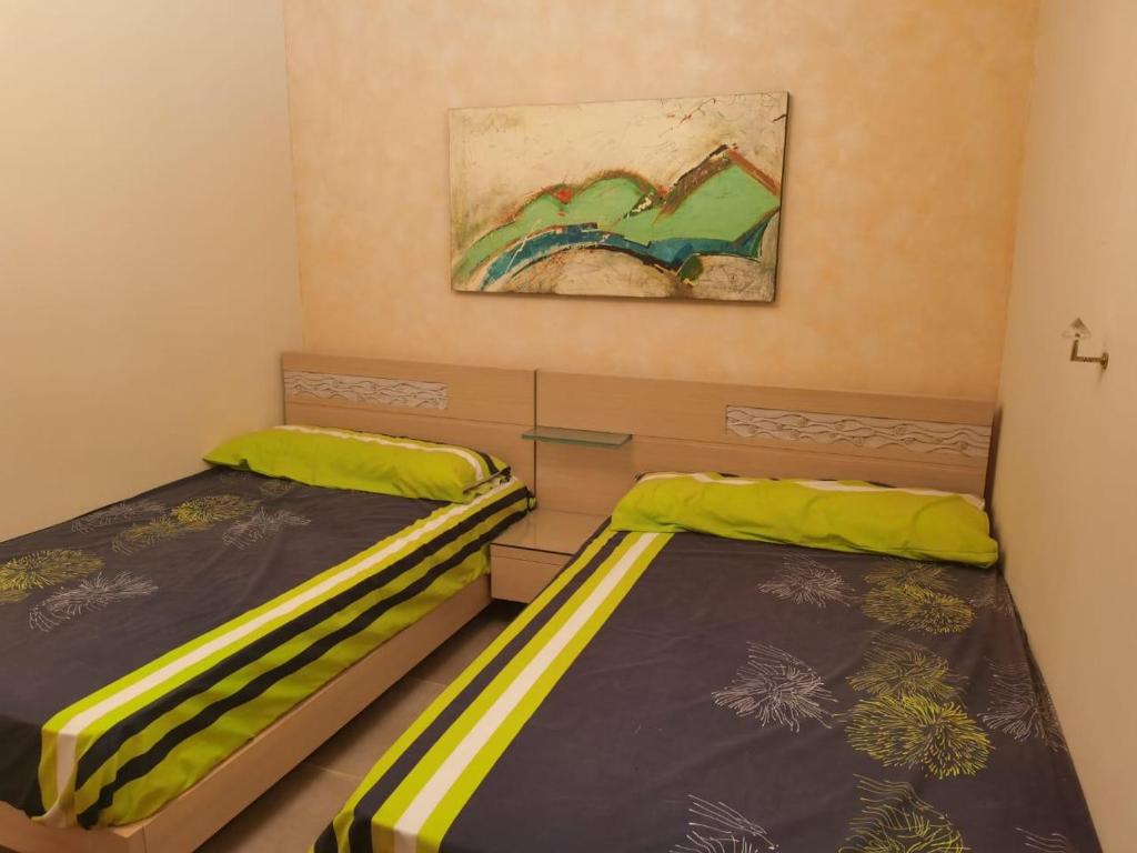 Postel nebo postele na pokoji v ubytování Porto Sokna Pyramids booking sea view apartment family only