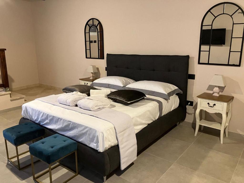 Postel nebo postele na pokoji v ubytování Residenza il Duomo