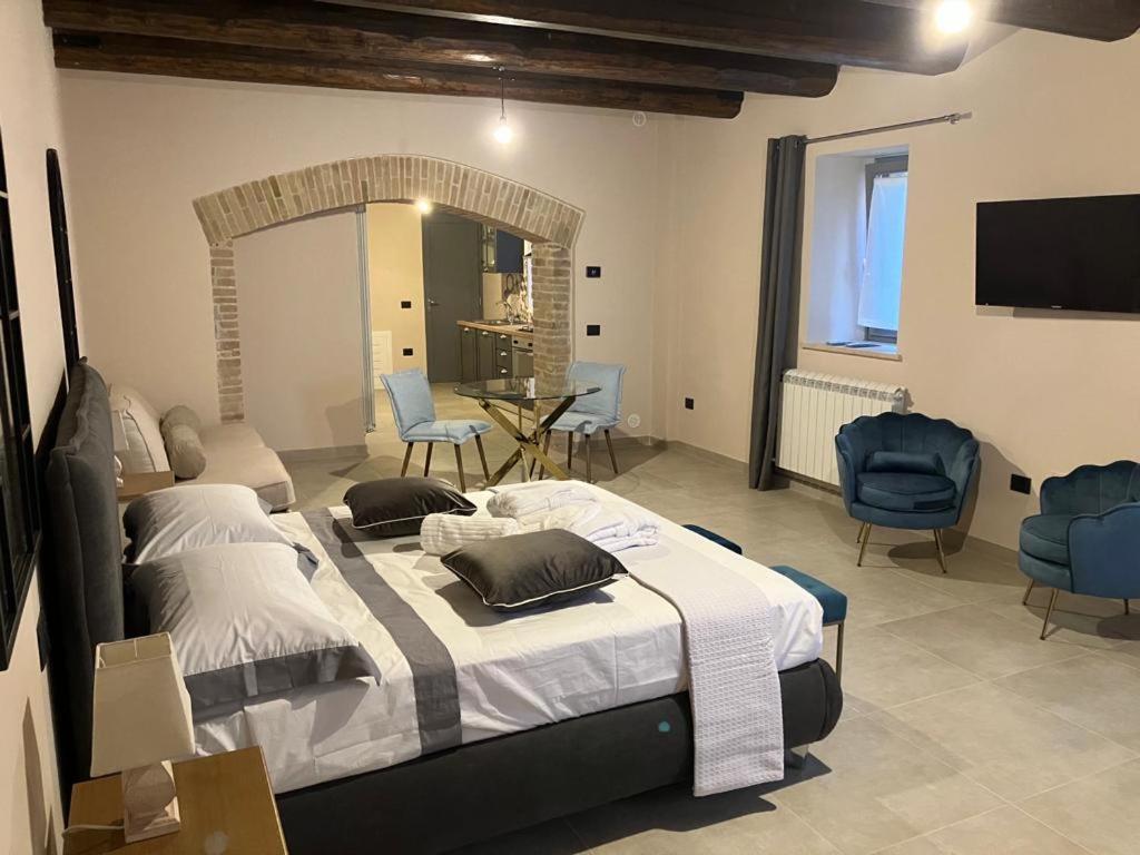 Postel nebo postele na pokoji v ubytování Residenza il Duomo