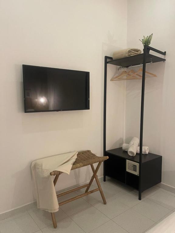 TV a/nebo společenská místnost v ubytování Moet Medellin Hotel