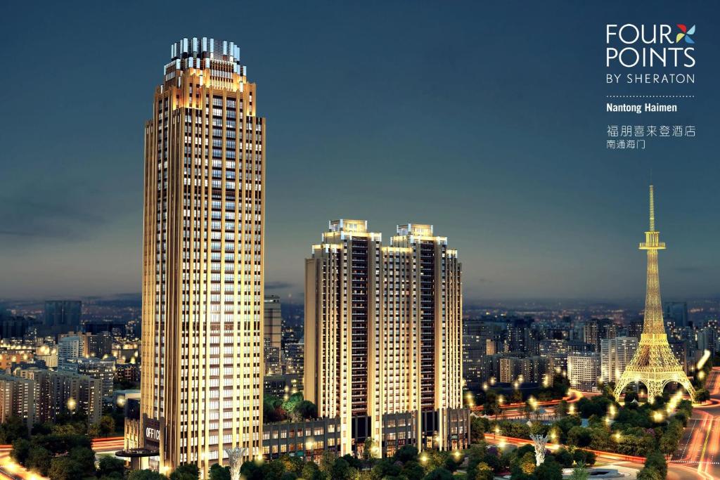a view of a city with two tall buildings at Four Points by Sheraton Nantong, Haimen in Nantong
