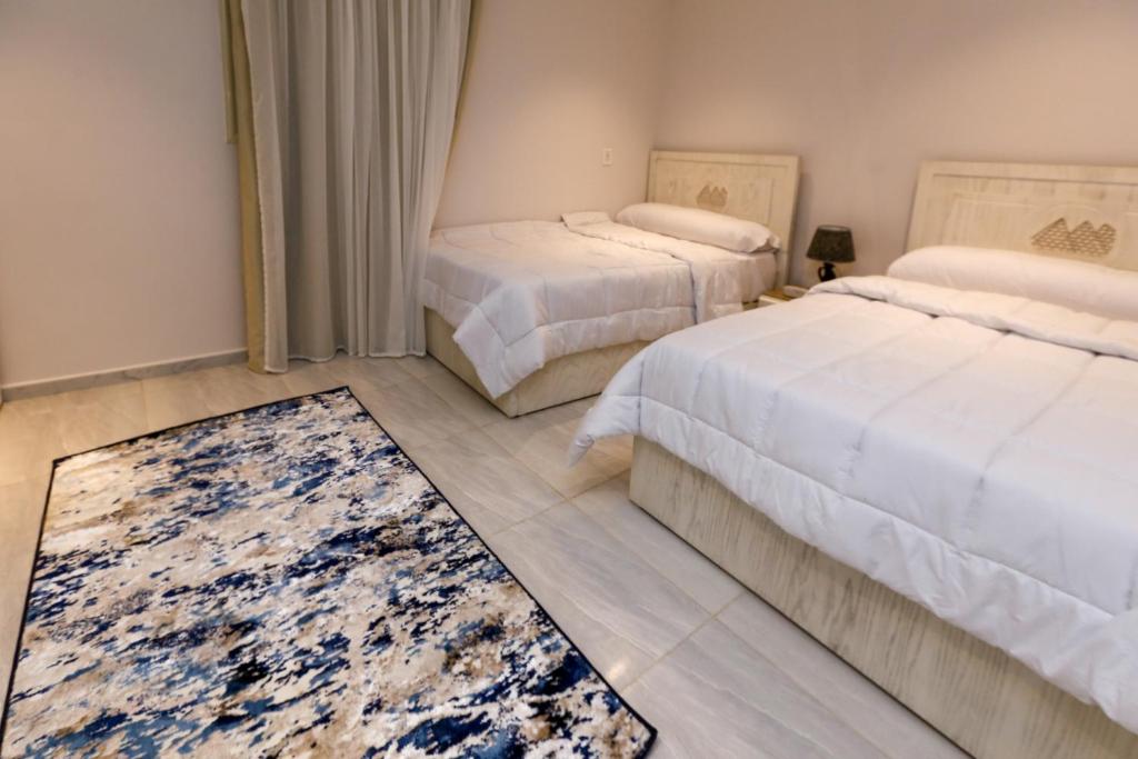 Postel nebo postele na pokoji v ubytování Pyramids Land Hotel