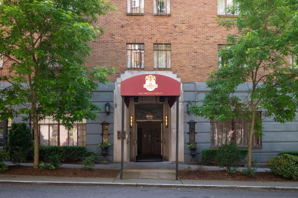 a building with a sign on the front of it at The Baroness Hotel in Seattle