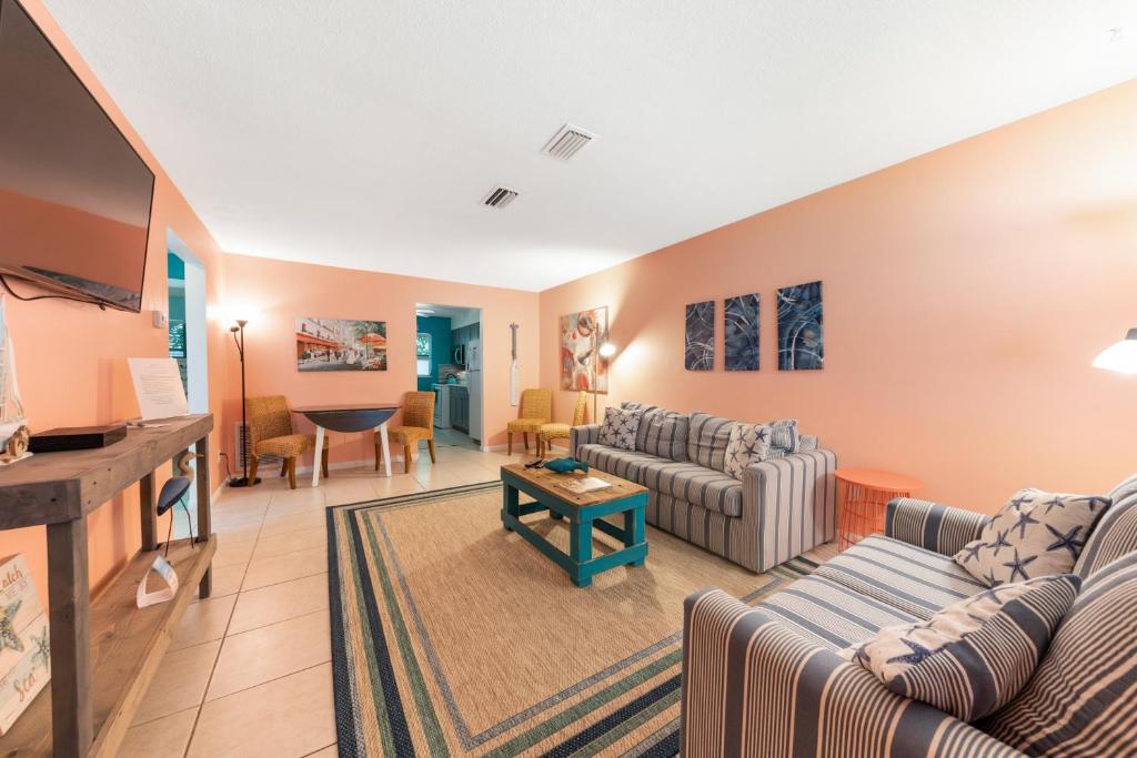 Et opholdsområde på Charming Beach Villa B