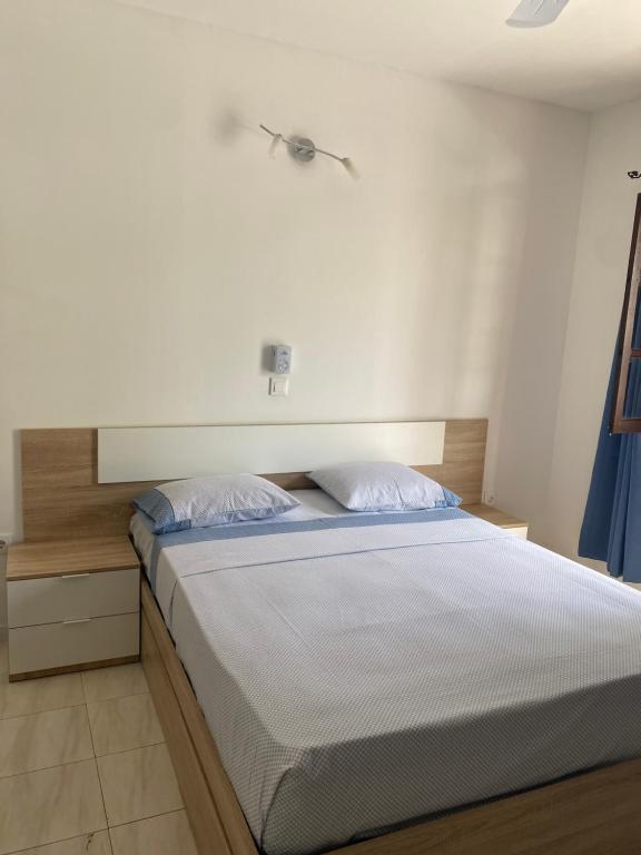 Postel nebo postele na pokoji v ubytování Katila-Rooms