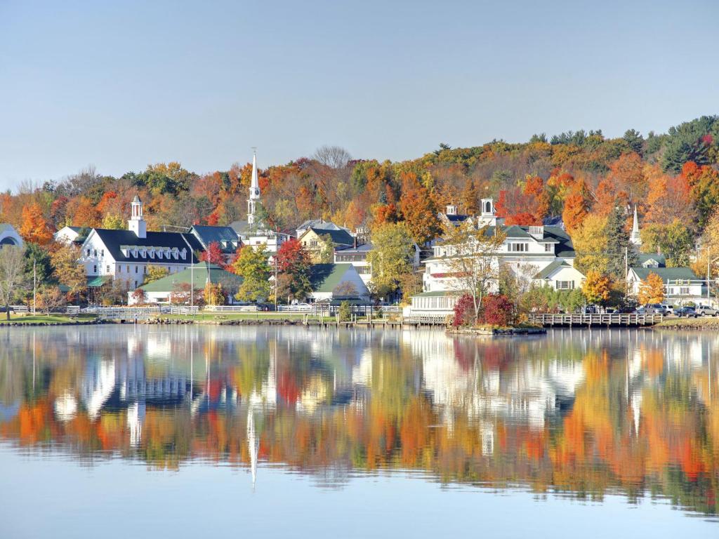 a town on the shore of a body of water at Mill Falls at the Lake in Meredith