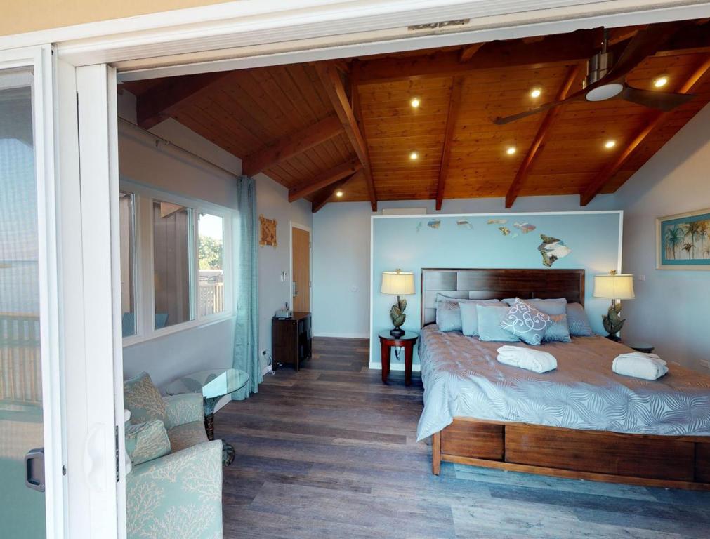 Postel nebo postele na pokoji v ubytování Hotel Moloka'i