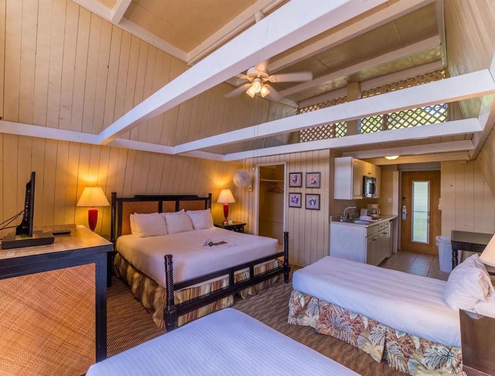 Postel nebo postele na pokoji v ubytování Hotel Moloka'i