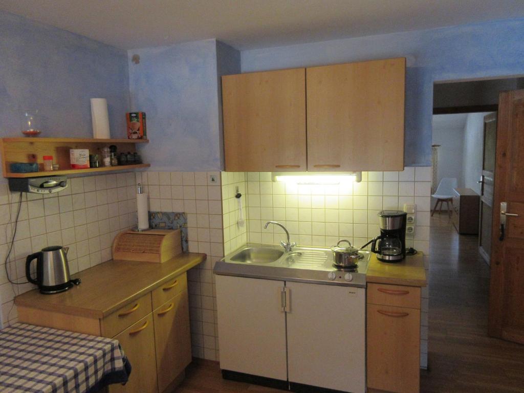 Kuchyň nebo kuchyňský kout v ubytování Geppingerhof