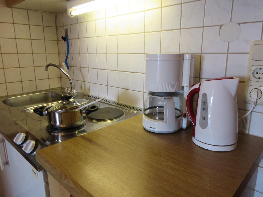 Příslušenství pro přípravu čaje a kávy v ubytování Geppingerhof