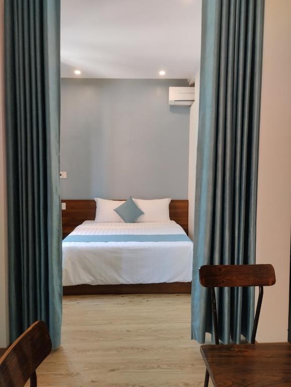 Giường trong phòng chung tại AnAn Homestay Huế
