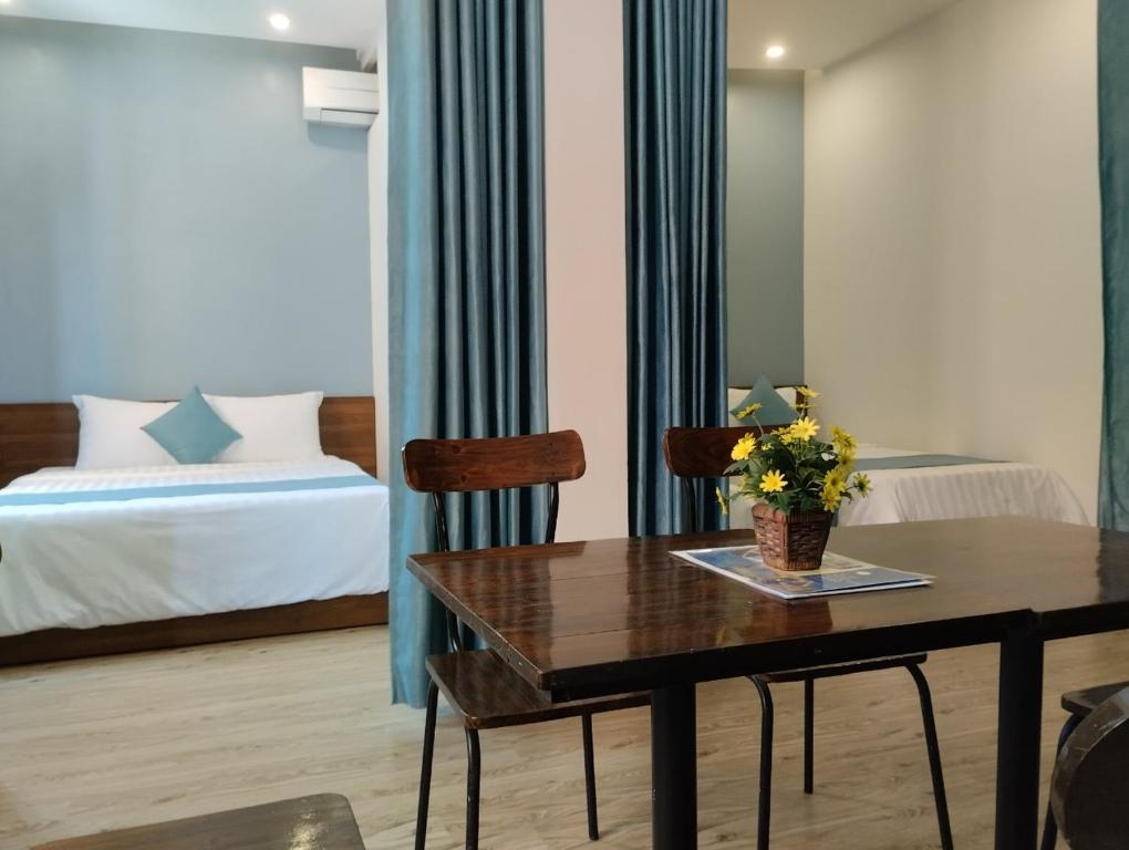 Giường trong phòng chung tại AnAn Homestay Huế