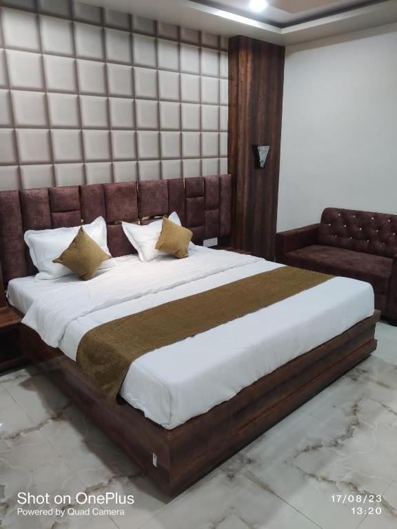 Postel nebo postele na pokoji v ubytování Hotel Praj Paradise