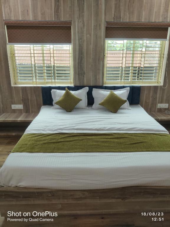 Postel nebo postele na pokoji v ubytování Hotel Praj Paradise