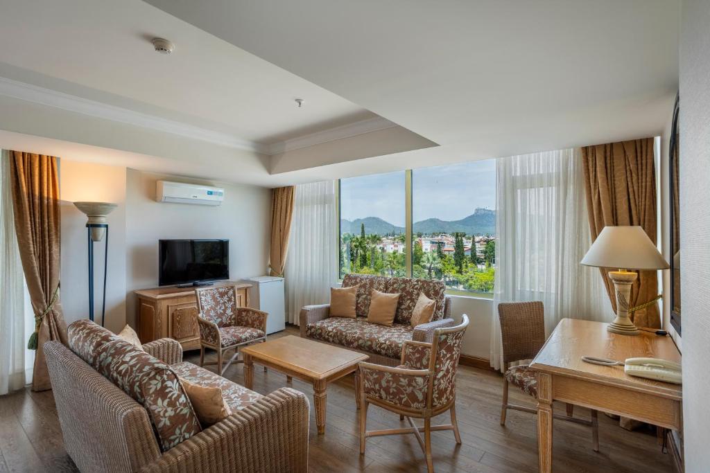 TV a/nebo společenská místnost v ubytování Simena Comfort Hotel