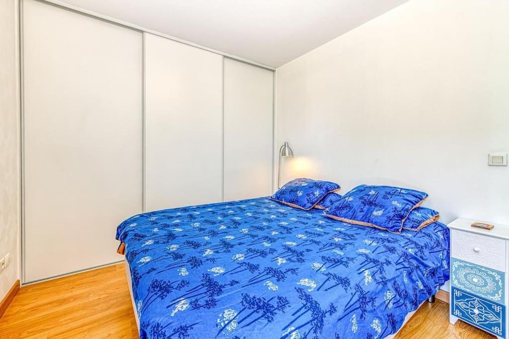 Postel nebo postele na pokoji v ubytování Standing, balcon avec vue, clim, tt équipé confort