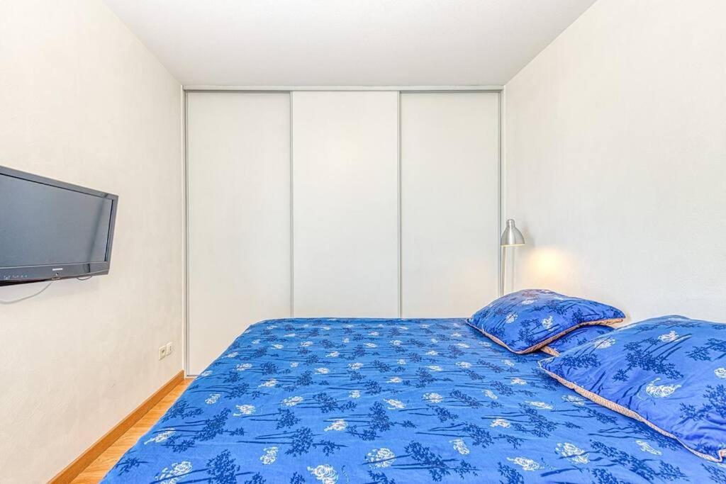 Postel nebo postele na pokoji v ubytování Standing, balcon avec vue, clim, tt équipé confort