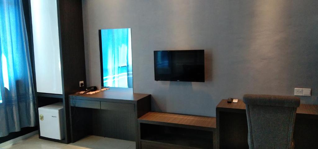 TV a/nebo společenská místnost v ubytování Pintarman Service Apartment