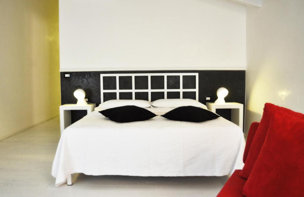 Postel nebo postele na pokoji v ubytování Casa Fola - City Centre Rooms