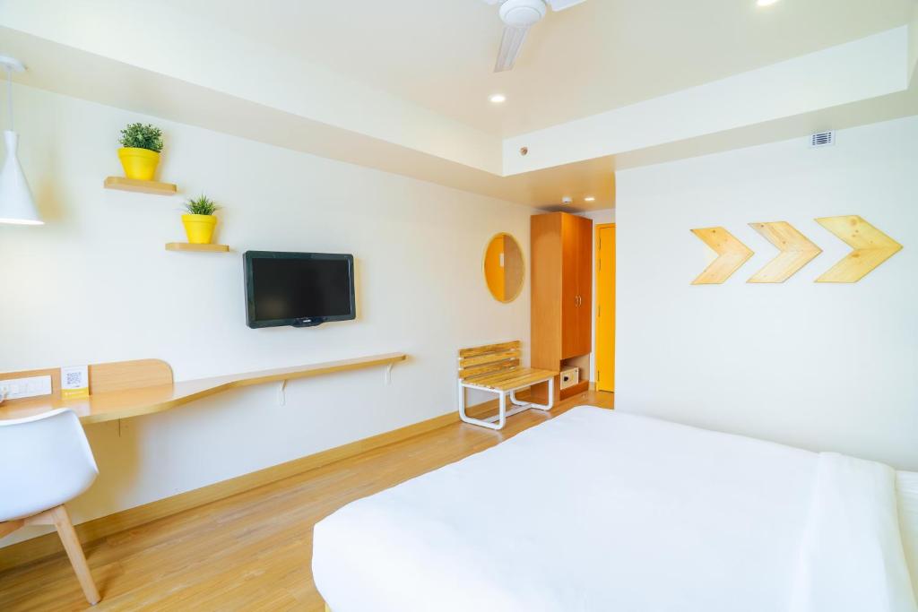 TV a/nebo společenská místnost v ubytování Bloom Hotel - Cyber Towers