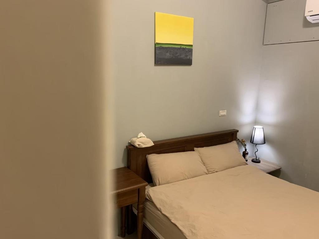 Postel nebo postele na pokoji v ubytování White Cat B&B