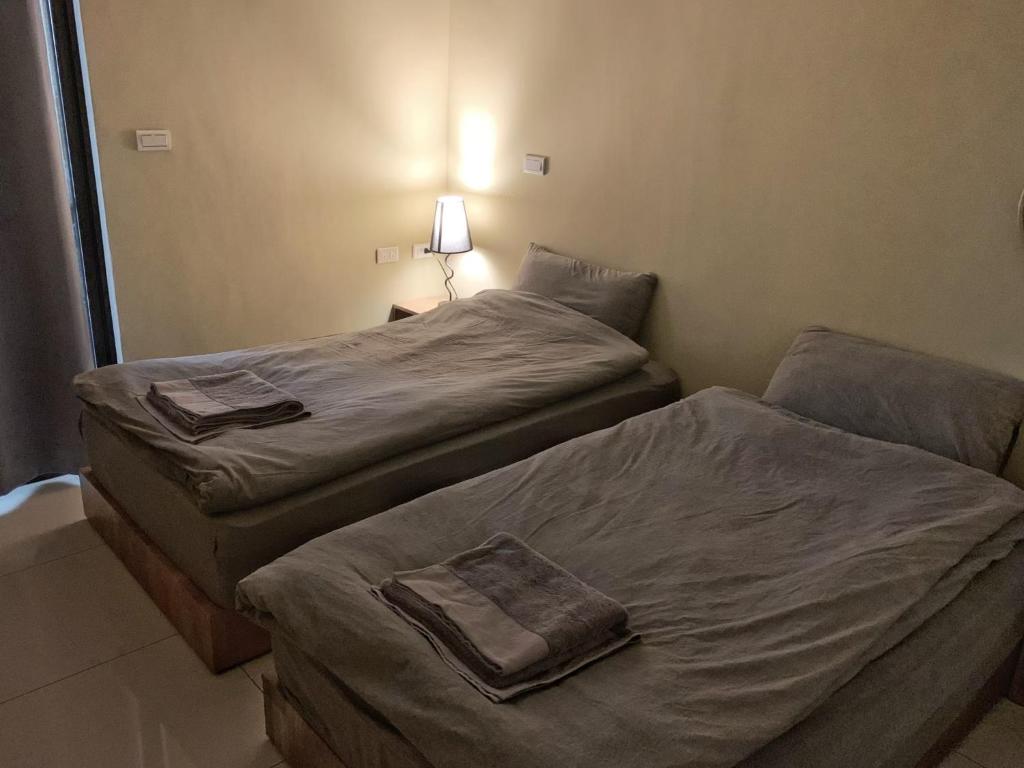 Postel nebo postele na pokoji v ubytování White Cat B&B