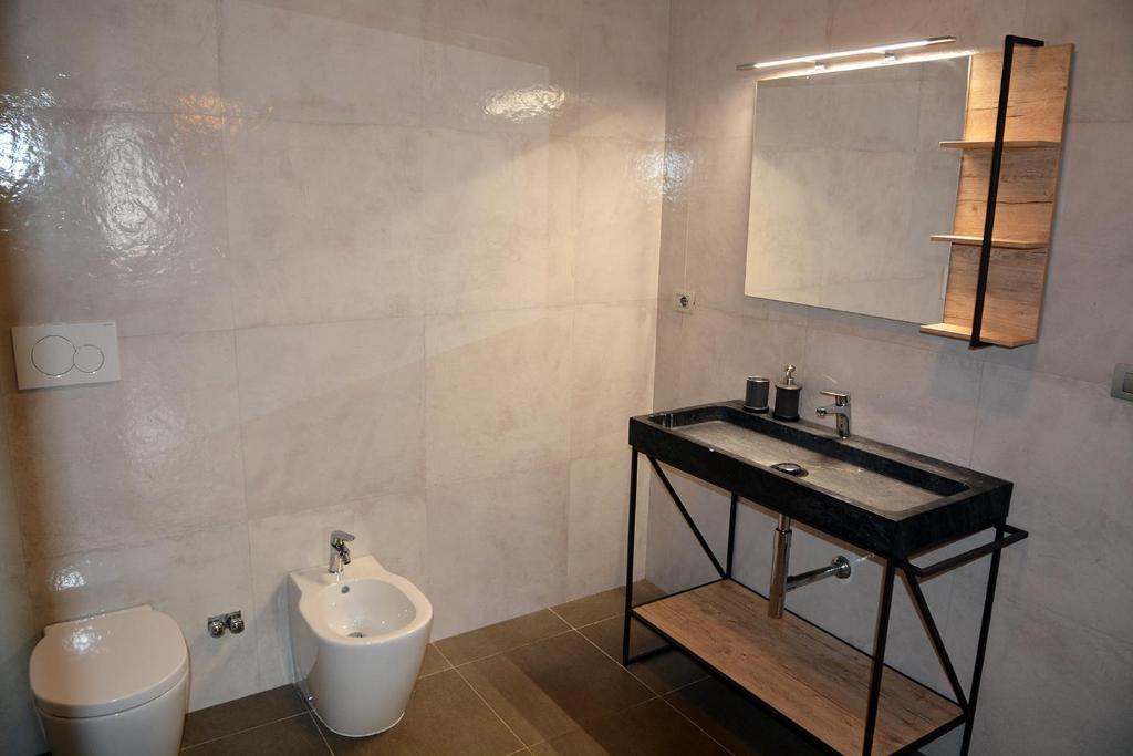 Koupelna v ubytování inStile aparthotel