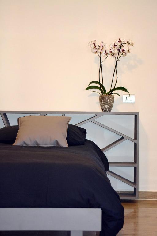 Postel nebo postele na pokoji v ubytování inStile aparthotel