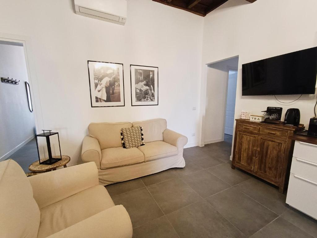 Televízia a/alebo spoločenská miestnosť v ubytovaní La tua casa a ViadelCorso