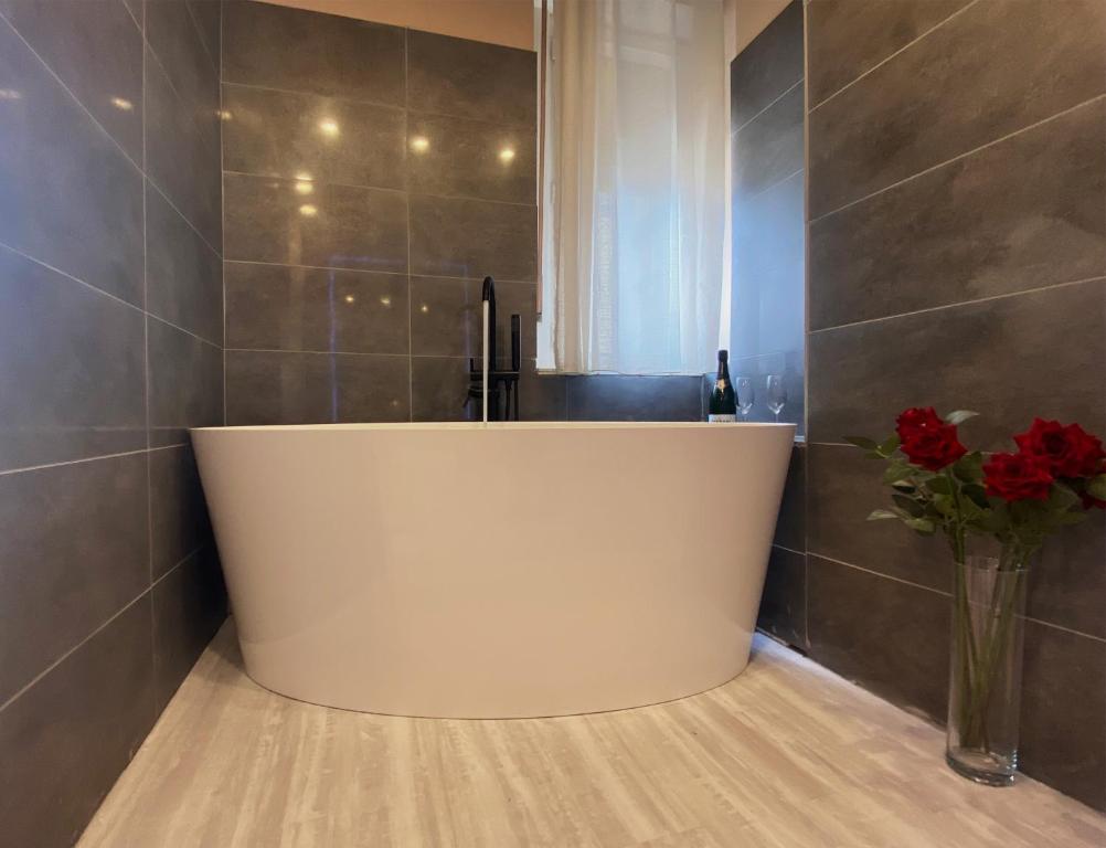 Kúpeľňa v ubytovaní Casa Rosmini rooms, Dolomia best home