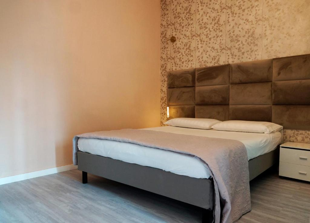 Posteľ alebo postele v izbe v ubytovaní Casa Rosmini rooms, Dolomia best home