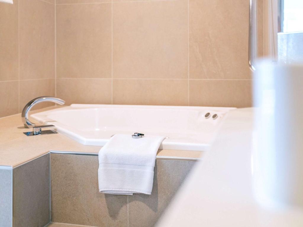 Koupelna v ubytování Novotel Cairns Oasis Resort