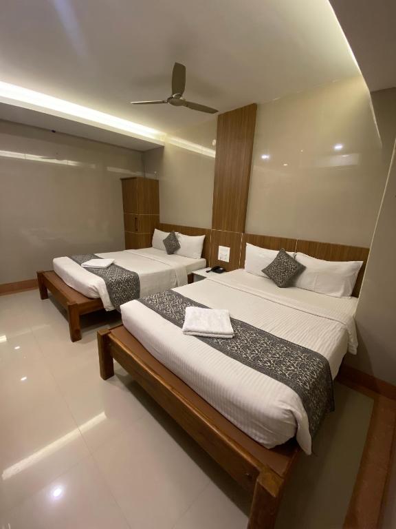 Postel nebo postele na pokoji v ubytování Hotel Sivas Regency