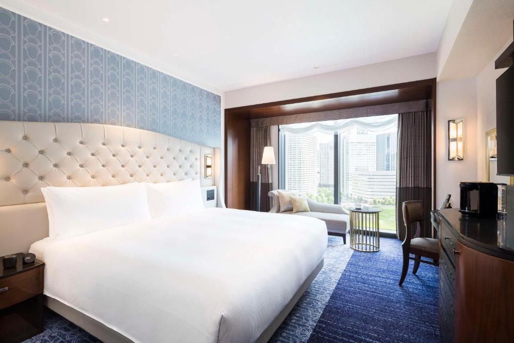 Postel nebo postele na pokoji v ubytování Hilton Yokohama
